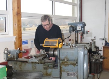 Member at the lathe in the Alford Men's Shed workshop